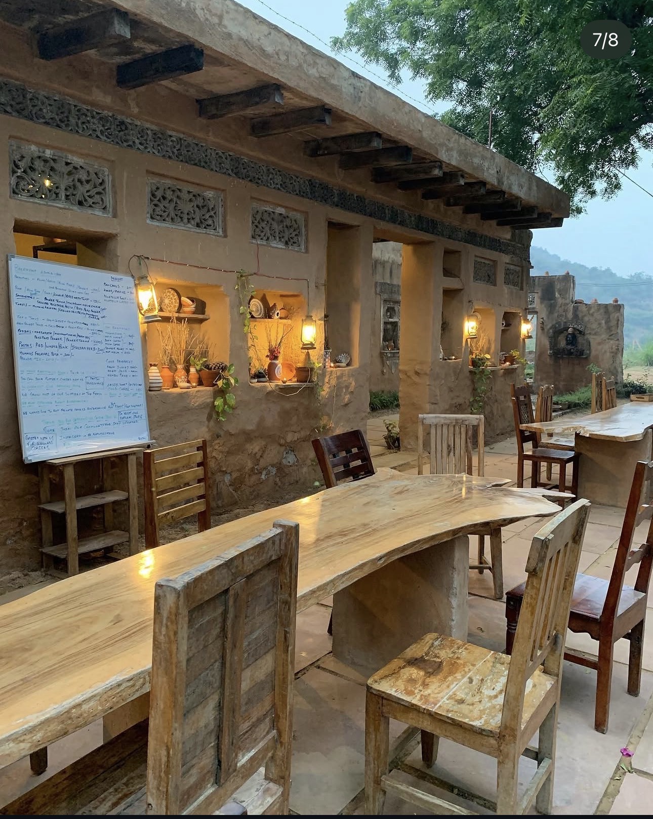 The restored haveli as a farm-to-table café at dusk